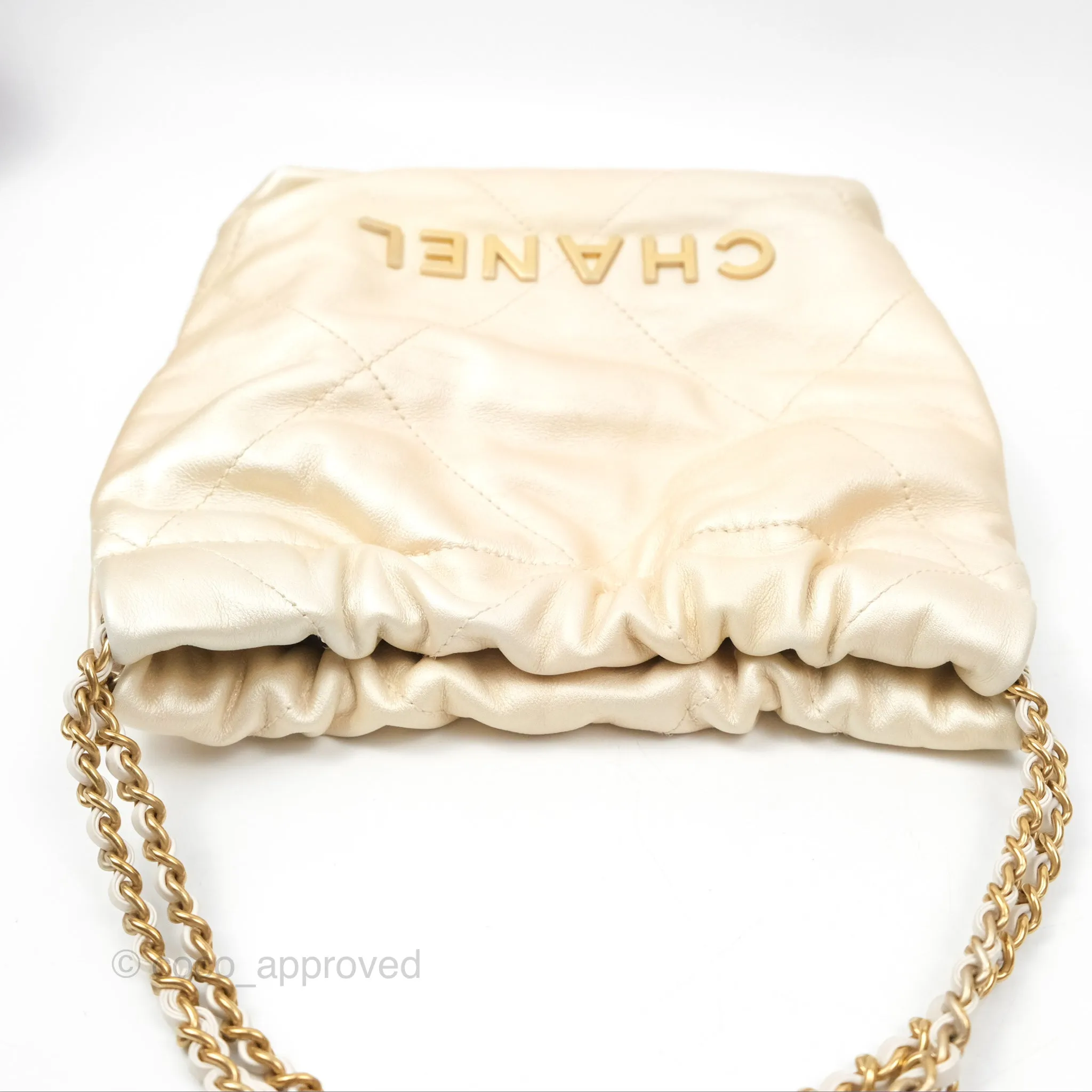Chanel 22 Mini Bag Iridescent Light Pearly Calfskin Aged Gold Hardware