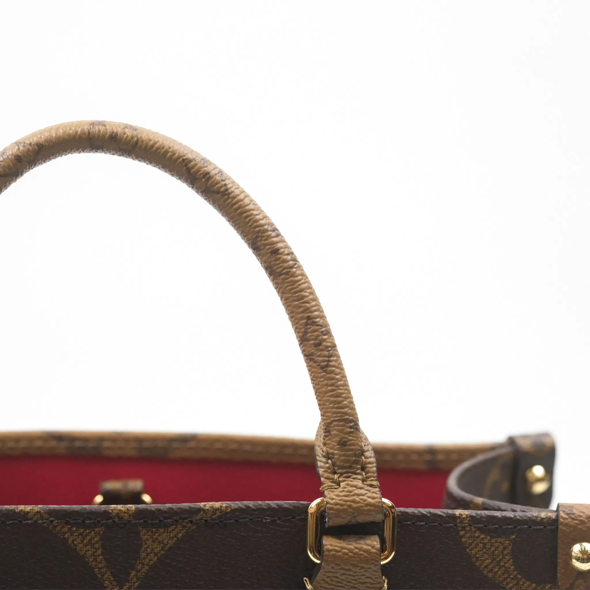 Louis Vuitton OnTheGo PM in Monogram Reverse Canvas