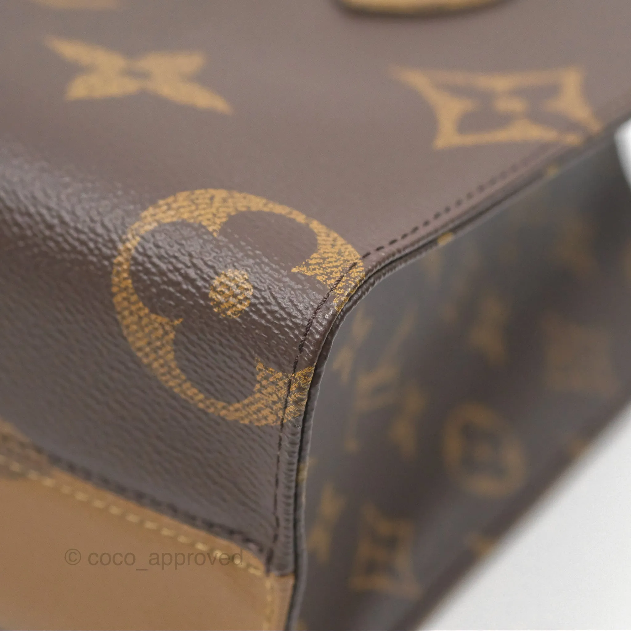 Louis Vuitton OnTheGo PM in Monogram Reverse Canvas