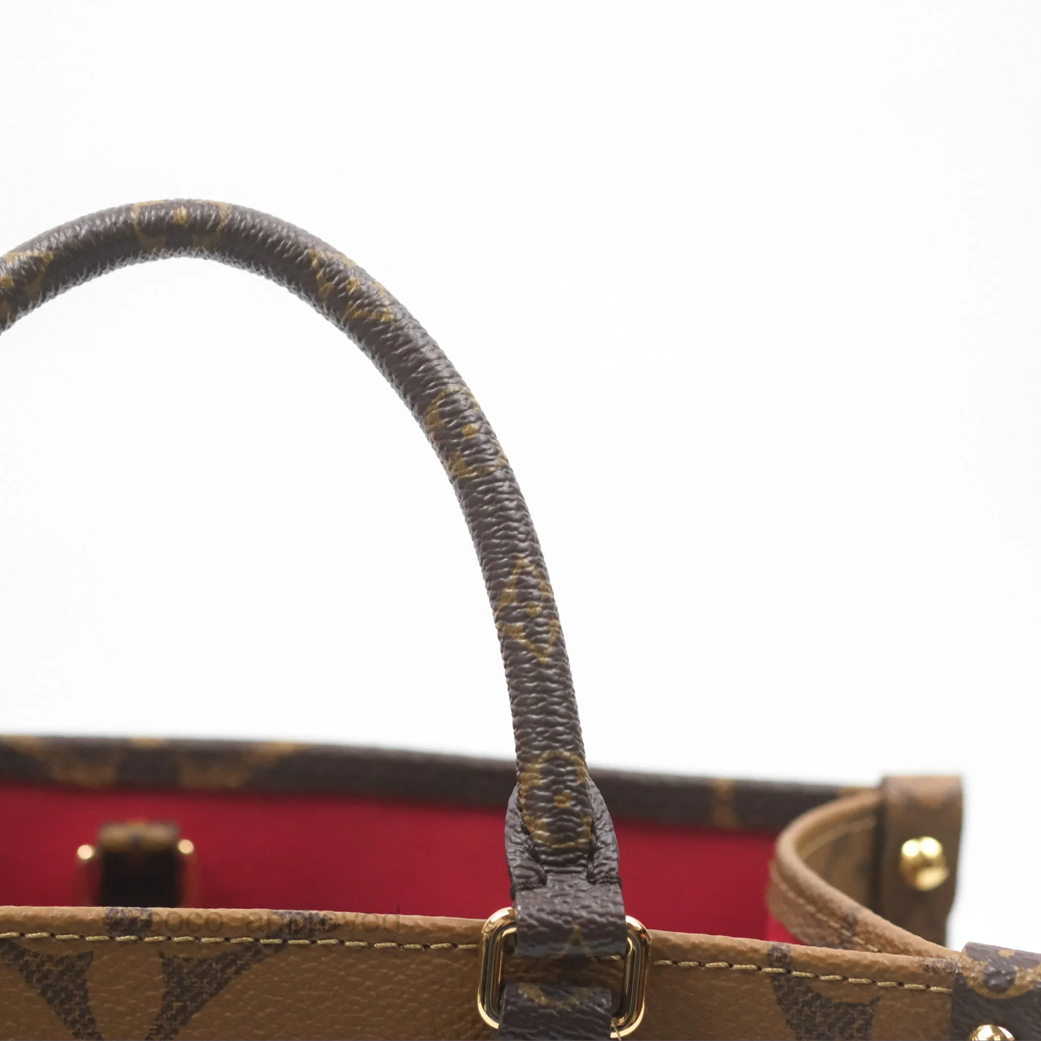 Louis Vuitton OnTheGo PM in Monogram Reverse Canvas