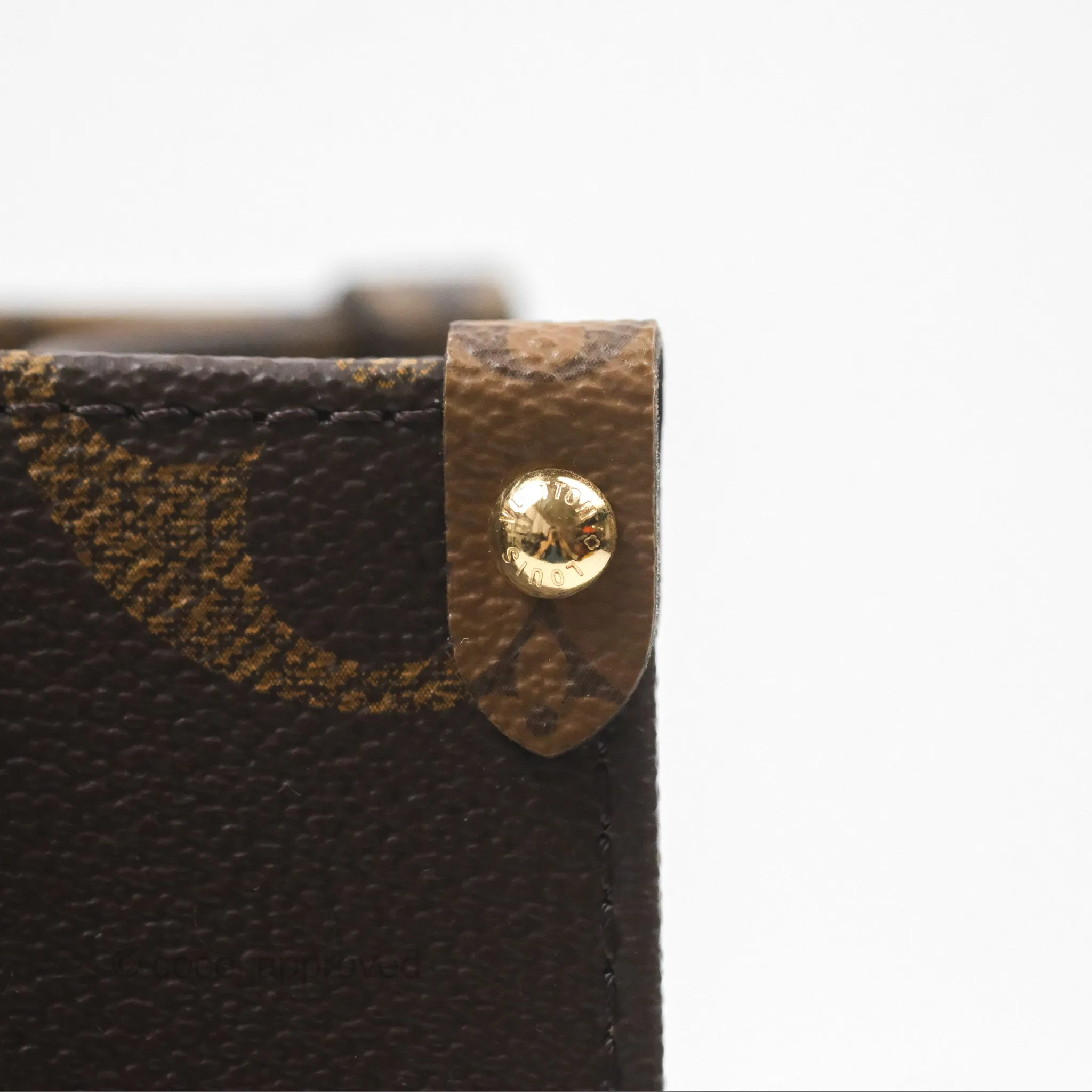 Louis Vuitton OnTheGo PM in Monogram Reverse Canvas