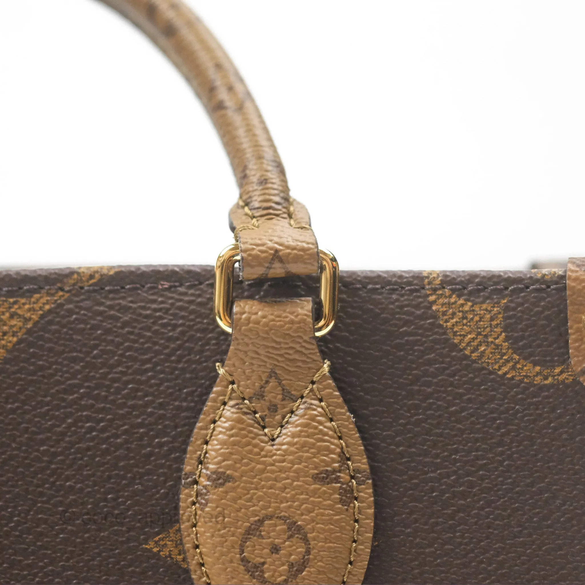 Louis Vuitton OnTheGo PM in Monogram Reverse Canvas