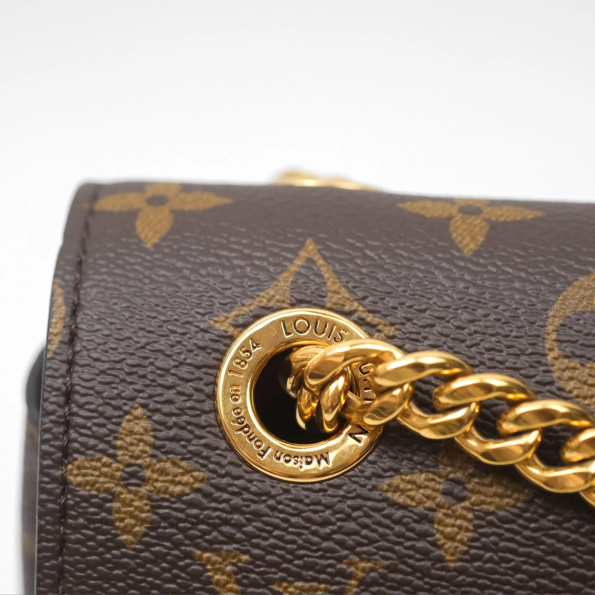 Louis Vuitton Passy Coated Canvas Monogram Gold Hardware