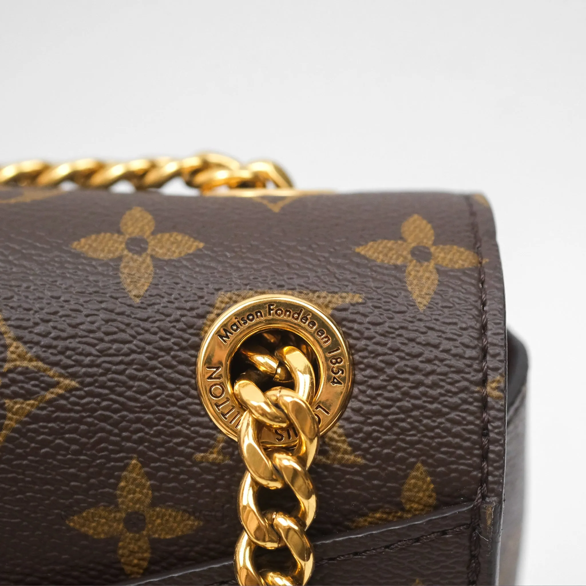 Louis Vuitton Passy Coated Canvas Monogram Gold Hardware