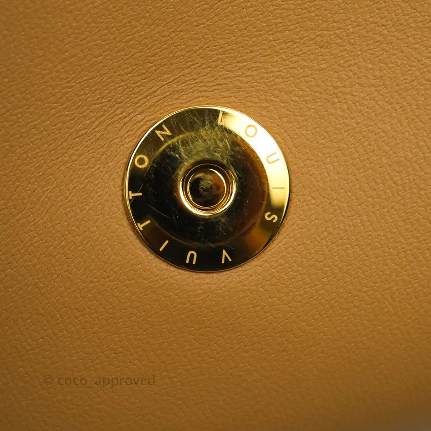 Louis Vuitton Pochette Coussin Monogram Caramel Beige Gold Hardware