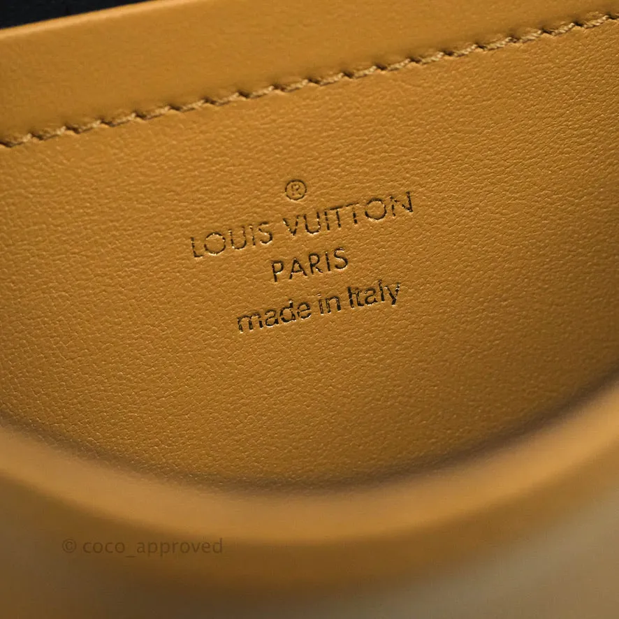 Louis Vuitton Pochette Coussin Monogram Caramel Beige Gold Hardware