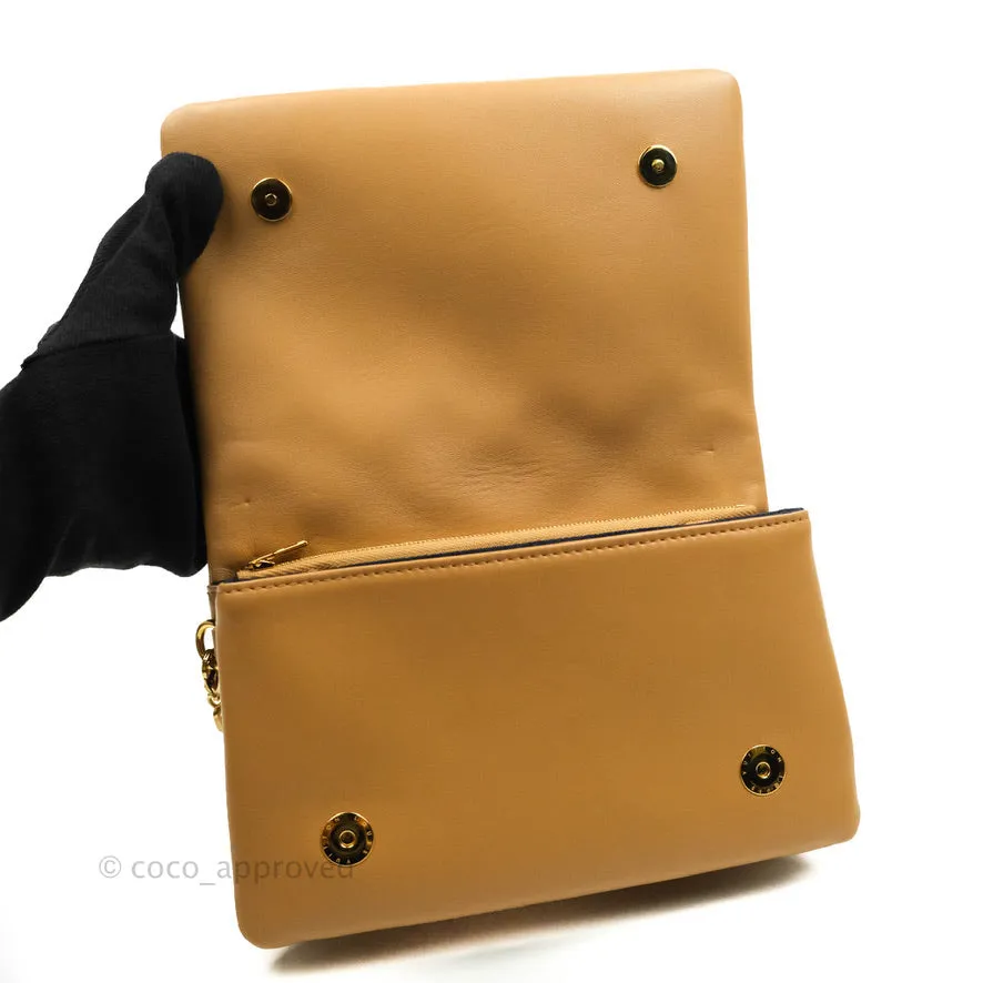 Louis Vuitton Pochette Coussin Monogram Caramel Beige Gold Hardware