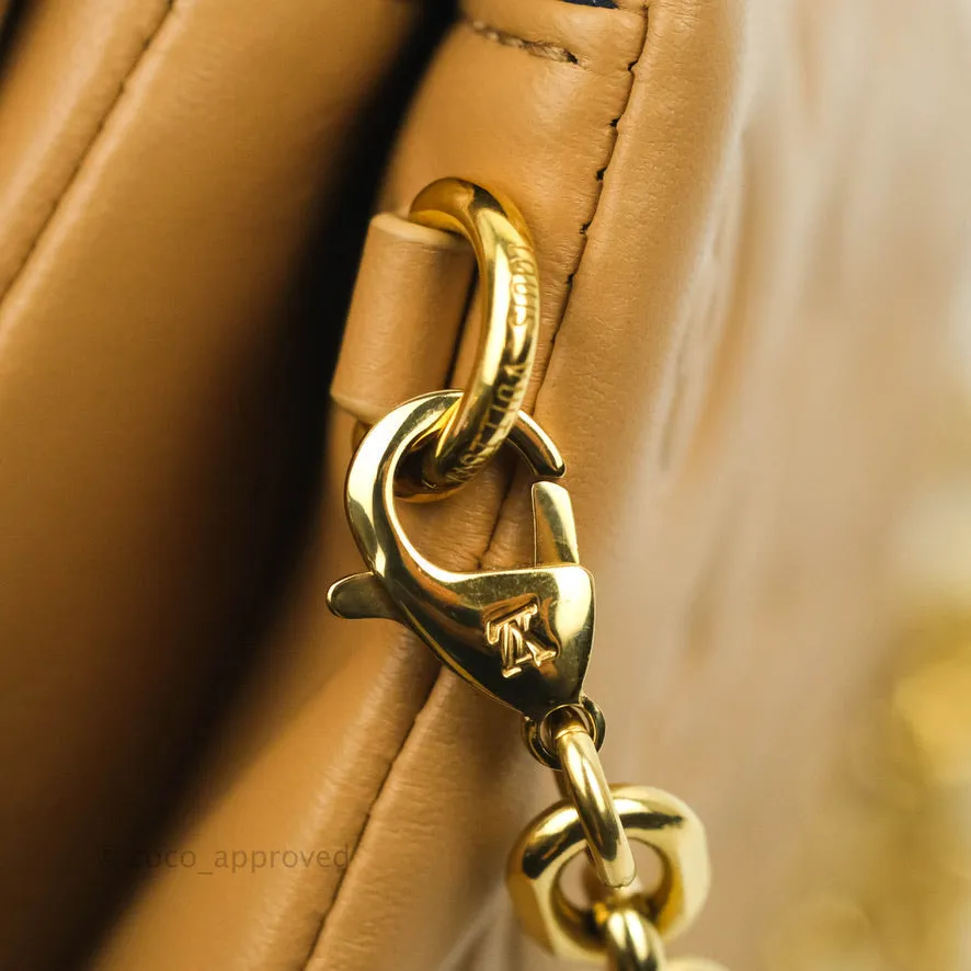 Louis Vuitton Pochette Coussin Monogram Caramel Beige Gold Hardware
