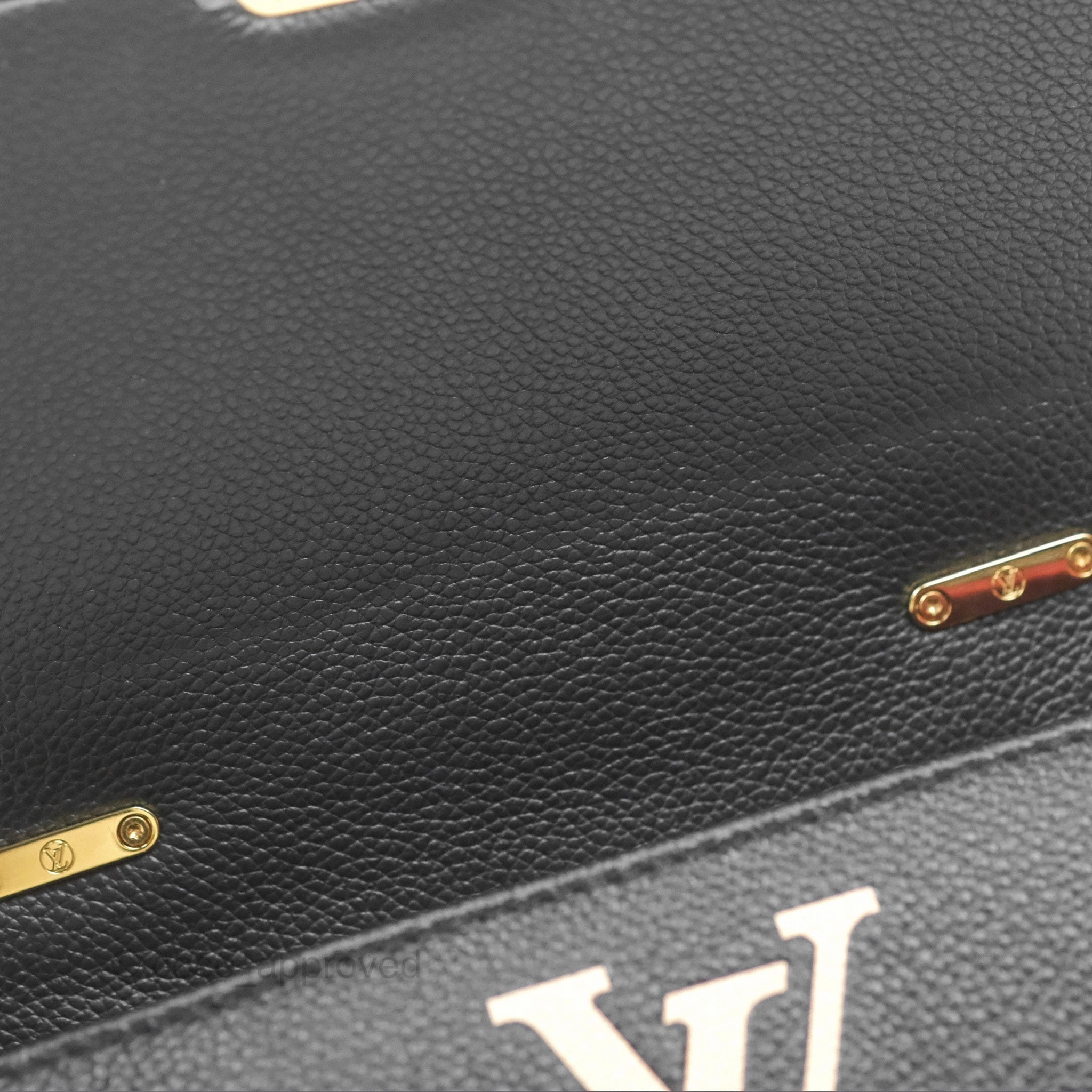 Louis Vuitton Madeleine BB Monogram Empreinte Black Beige